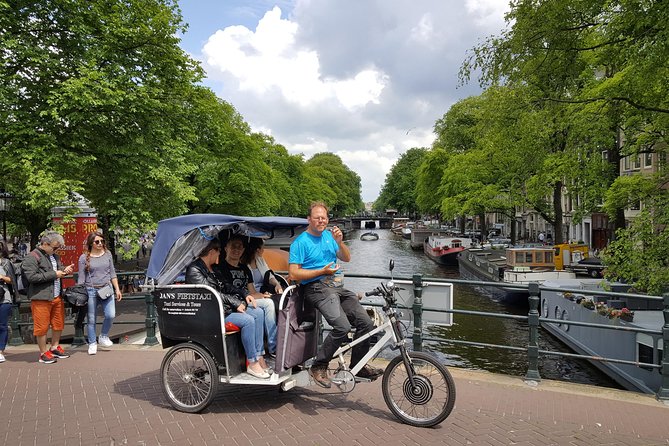 1,5 hours Amsterdam Rickshaw Tour - Starting with the Canal Ring and its canal houses