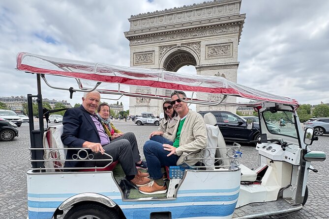 4 Hour Grand Paris Tour by Electric Tuk Tuk See Almost Everything - The Louvre, Place Vendôme, and the Opera district
