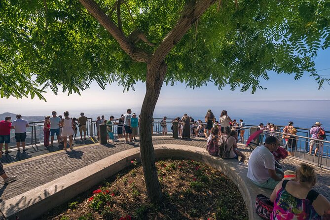 A great tuk-tuk adventure Tour at Cabo Girão - Skywalk - Câmara de Lobos brings the tour back to street level