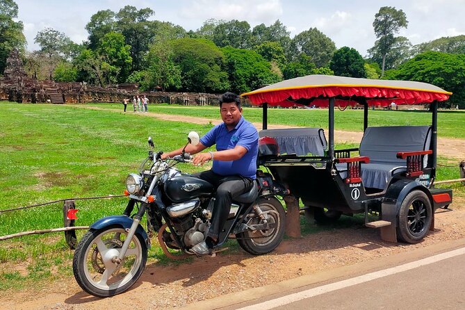 Angkor Wat Private Tour by Tuk-Tuk with English Speaking Driver - Bayon Temple and its calm stone faces