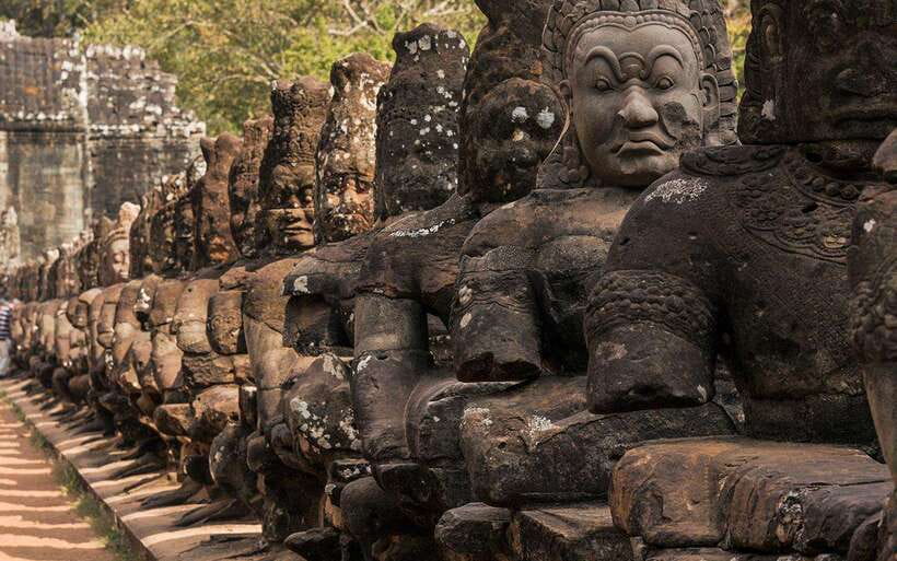 Angkor Wat Sunrise Private Tuktuk Tour in Siem Reap - Bayon’s stone faces