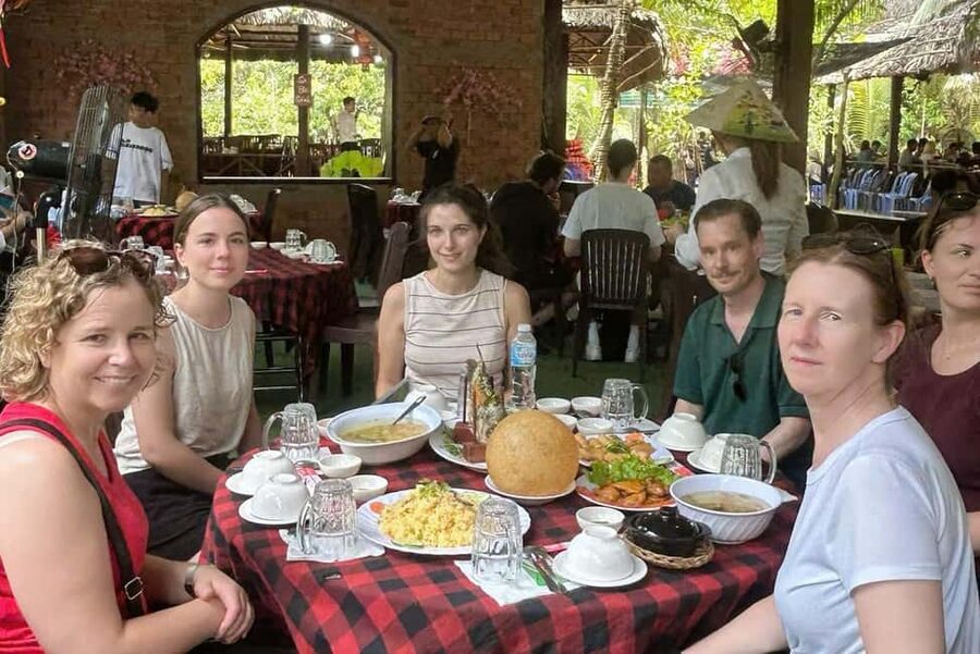 Authentic Mekong Delta: Tuk Tuk, Rowing Boat, Biking Tour - Lunch beside the river
