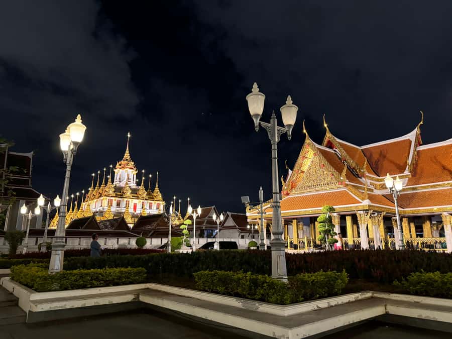 Bangkok: TUK TUK Tour Night Life Private with Hotel Pick Up - Wat Arun appears across the river