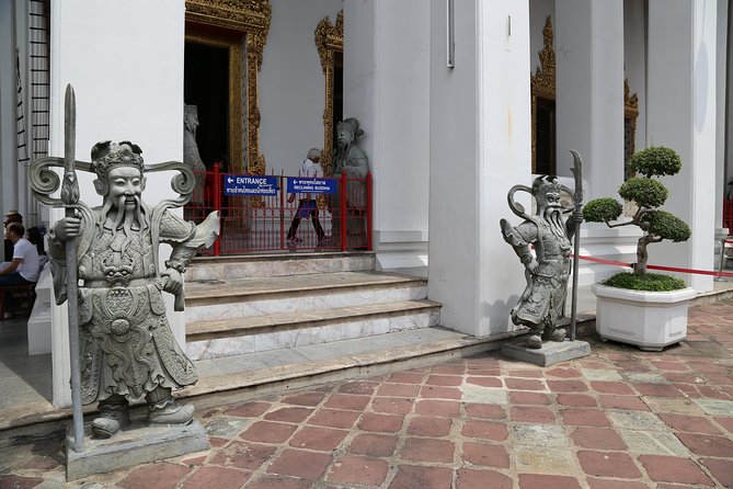 Bangkok Tuk Tuk Walk & Temple Tour With Wat Pho, Arun & Traimit - Tuk tuk, BTS, and public boats: what the transport adds