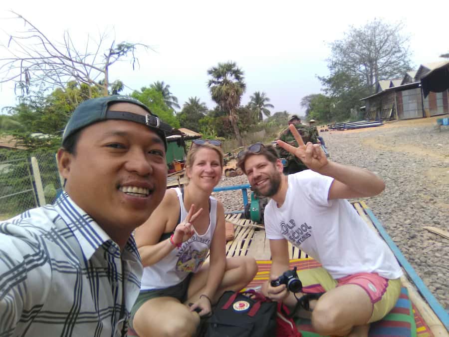 Battambang family tuktuk tour BambooTrain/Wat Banan/Bat cave - Riding the bamboo train on a single track