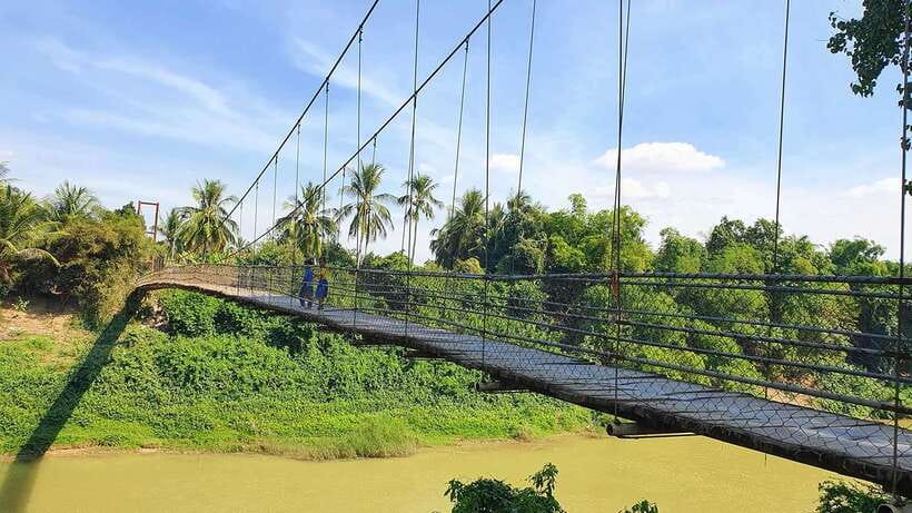 Battambang: Tuk-Tuk, Bamboo Train, Killing/Bat Caves, Sunset - Rice fields, fruit plantations, and the wooden bridge
