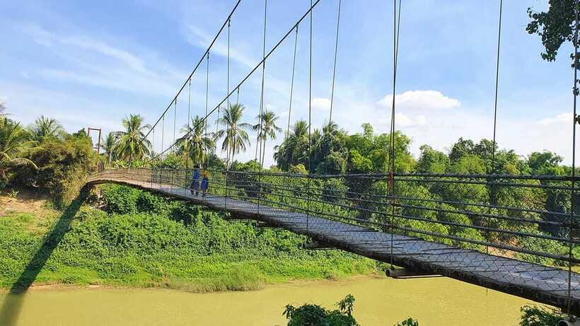 Battambang: Tuk-Tuk, Bamboo Train, Killing/Bat Caves, Sunset - A village lunch, fresh fruit, and rat barbecue