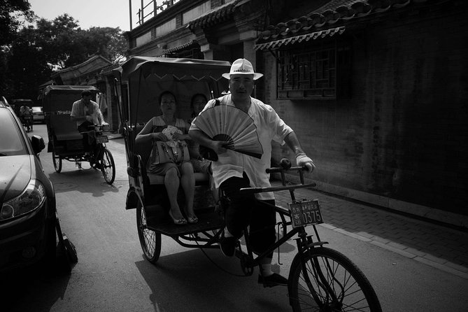 Beijing Old Hutongs Tour by Rickshaw - Riding through the hutongs by pedicab
