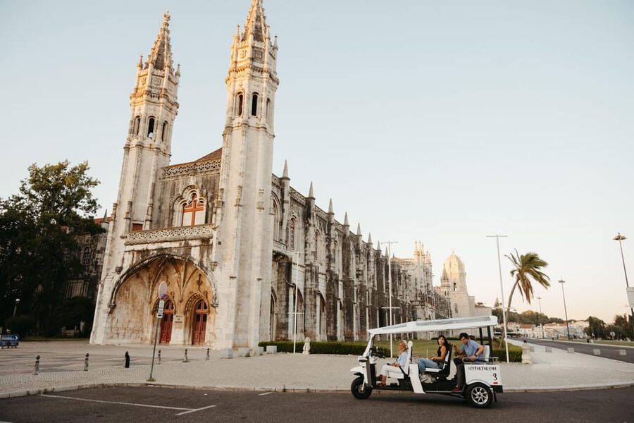 Belém: Private City Tour by Eco Tuk Tuk - Belém Tower beside the river