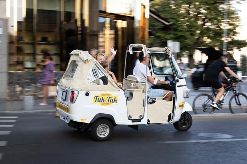 Bucharest: Best of Bucharest Private Tuk-Tuk Tour - Revolution Square explains modern Romania