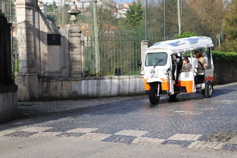 Coimbra: TukTuk Adventure. Local and multilingual host. Hotel pickup. - Starting at Largo da Portagem