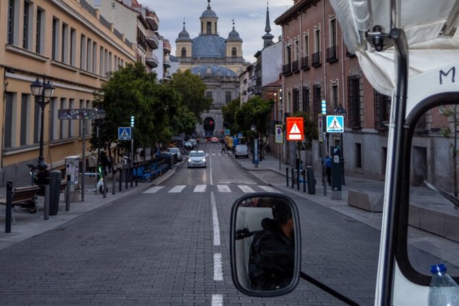 Discover Madrid in a Fun & Eco-Friendly Tuk-Tuk – Private Tour - Salamanca, Colón, Las Letras, and the Arab Wall