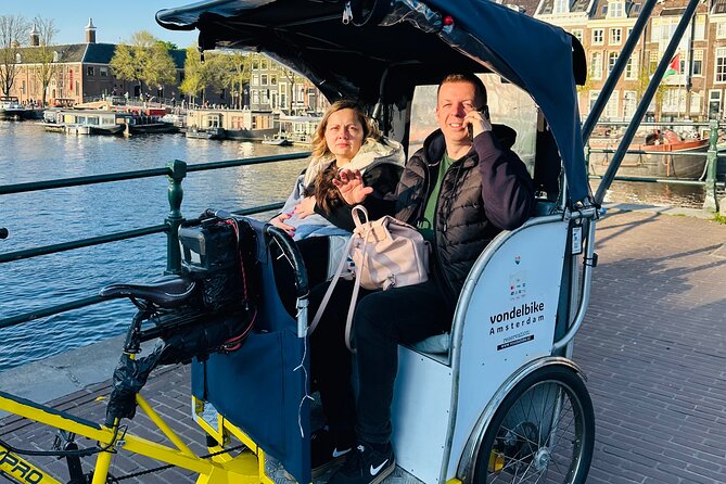 Explore Amsterdam in 75 Minutes – Pedicab Rickshaw City tour - Dam Square: the city’s main public stage