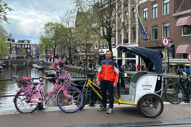 Explore Amsterdam in 75 Minutes – Pedicab Rickshaw City tour - Magere Brug and the Amstel River