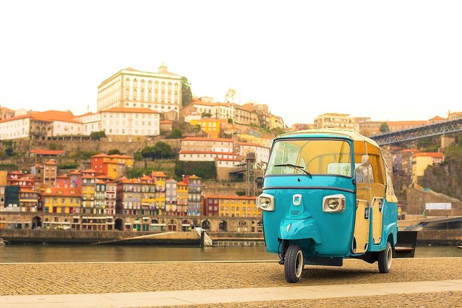 Full-Day Private Tuk Tuk All Around Porto - Gold-covered woodwork and the climb toward Clérigos