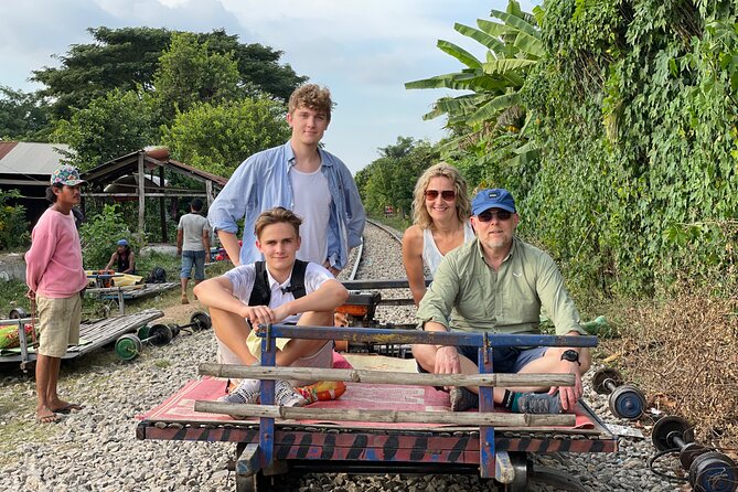 Full day tour by bicycle & tuk tuk,bamboo train,bat cave,villages - Morning cycling through Battambang’s old center