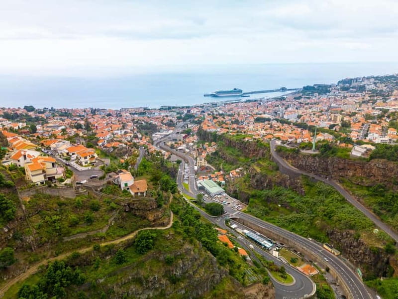 Funchal: Botanical Garden & Old Town Tour by TukTuk (1h45) - A private tuk-tuk ride with a local voice