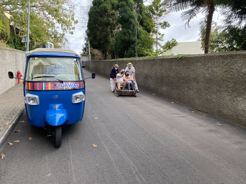 Funchal: Monte Tropical Garden & Toboggan Ride by Tuk Tuk - Monte Church and the stories behind the hilltop