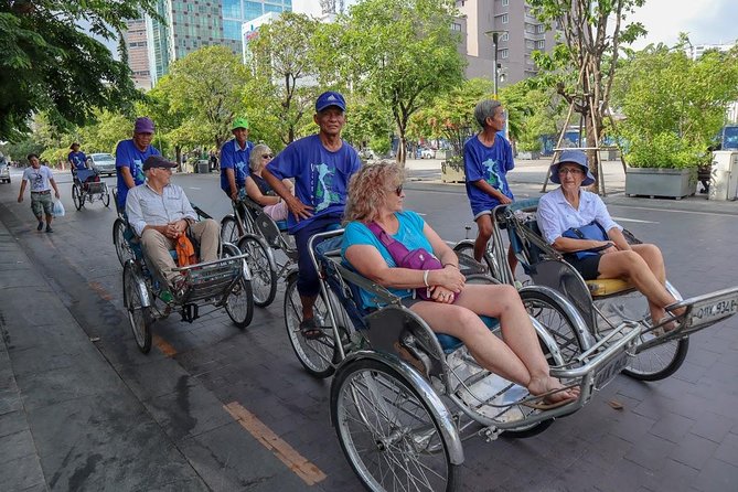 Half-Day Private Cyclo Tour Of Ho Chi Minh Highlights - Riding Nguyen Hue Street at local street level