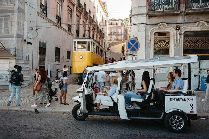 Historic Lisbon Tour with Local Guide in Private Eco Tuk Tuk - Chiado and Bairro Alto: cafés, shops, and evening energy