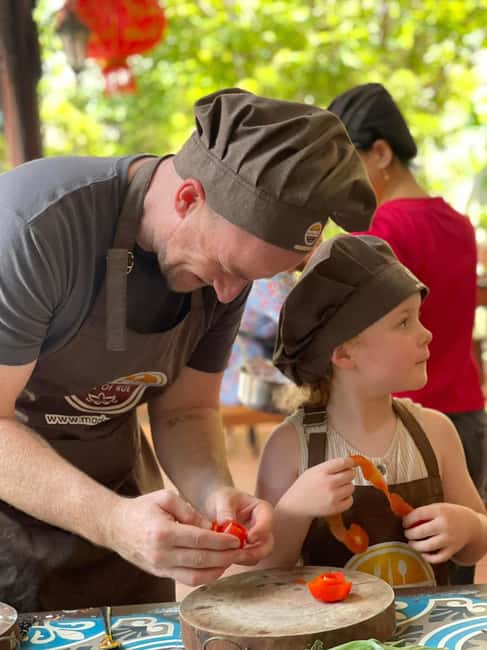 Hue City: Cyclo, Market Tour & Cooking Class at Madam Thu - A generous meal at the end