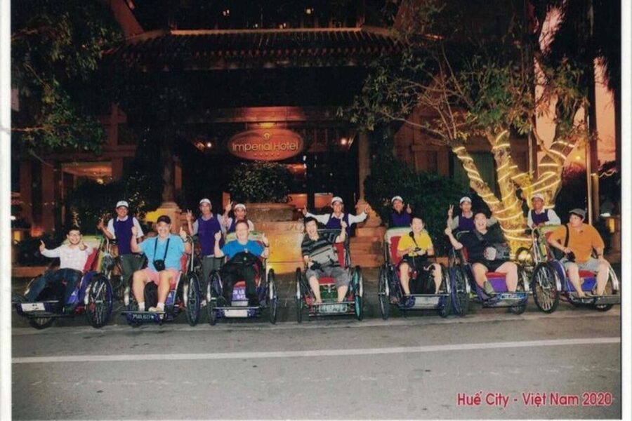 Hue: Night Street Food Tour by Cyclo with a Local Guide - Crossing Truong Tien Bridge at night