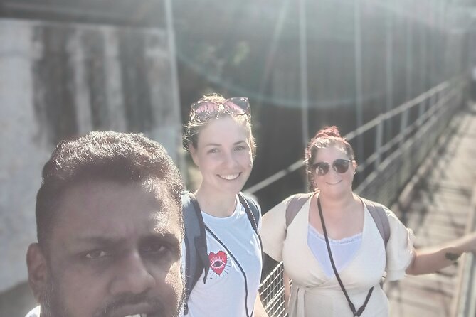 Kandy City Tour with Tuk-Tuk Private Experience - Crossing the riverside suspension bridge
