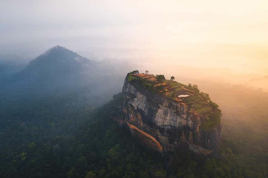 Kandy: Sigiriya and Dambulla Day Trip with Tuk Tuk Ride - Local wood carving and batik textiles