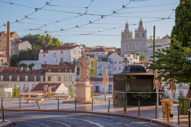 Lisbon Early Morning TukTuk Tour with hotel or cruise ship pickup - Rossio and the Triumph Arch before the crowds