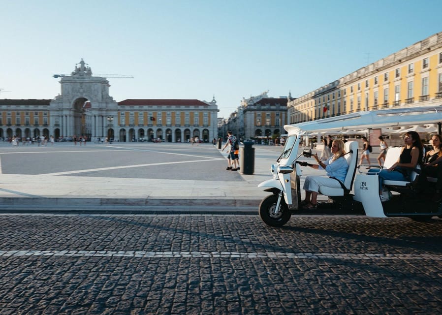 Lisbon: Private Christmas Lights Tour by Eco Tuk Tuk - Chiado: elegant streets and bright shopfronts