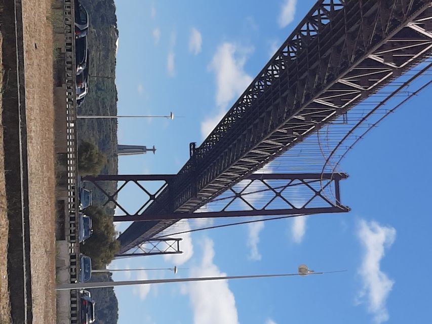 Lisbon: Private Tuk Tuk Tour Christ the King & Abril Bridge - Christ the King and the wide river view