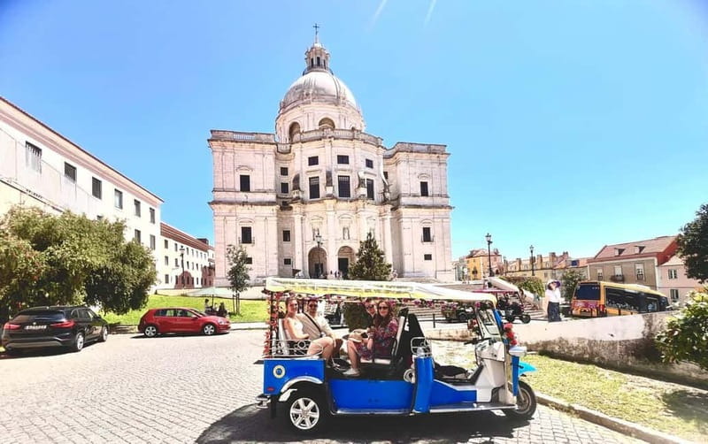 Lisbon: Private Tuk Tuk Tour with Polaroid Photos - Two Polaroid photos, with one weather catch