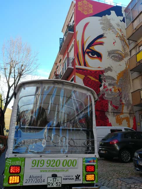 Lisbon Street Art by Tuk Tuk : Graffiti & Murals Discovery - Portas do Sol and the view across old Lisbon