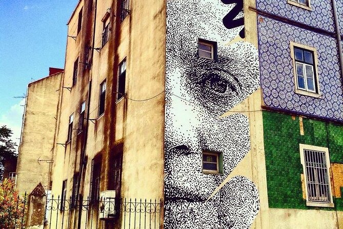Lisbon Street Art - Private Guided Tour in a Electric Tuk Tuk - Portas do Sol and the illustrated story of Lisbon