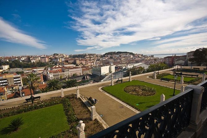 Lisbon Viewpoints Tuk Tuk Tour - São Pedro de Alcântara pairs gardens with a city view