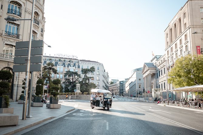 Madrid Expert Tour with Local Guide in Eco Tuk Tuk Private - Salamanca streets and the Bernabéu