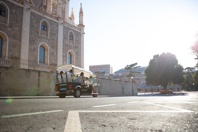 Madrid Express Tour with Local Guide in Eco Tuk Tuk Private - Plaza de Neptuno, Plaza de Cibeles, and football tradition