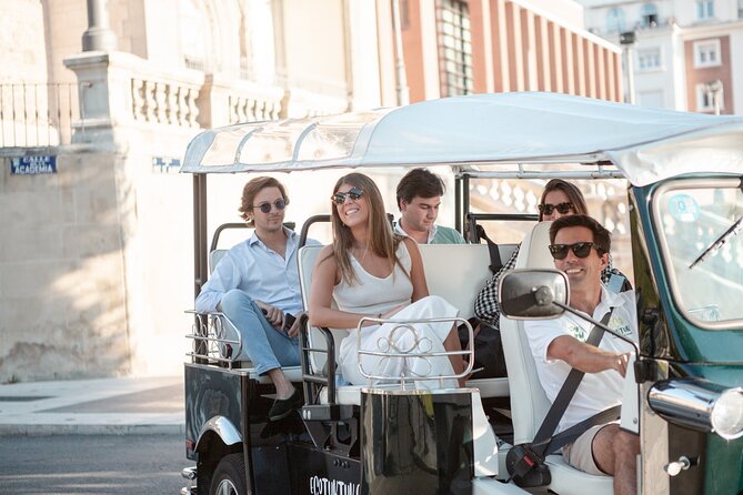 Madrid Express Tour with Local Guide in Eco Tuk Tuk Private - Puerta de Alcalá and the eastern edge of the center
