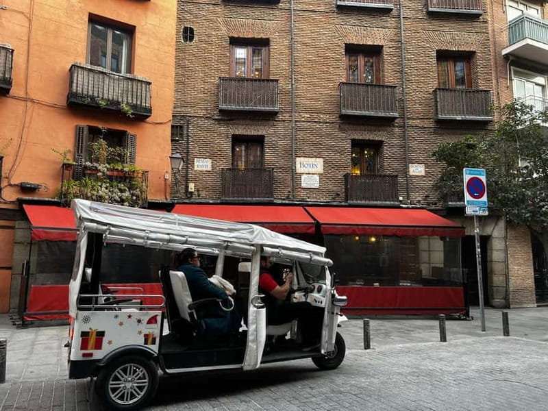 Madrid: Highlights City Tour by Electric Tuk Tuk - From San Miguel Market to the Las Letras Quarter