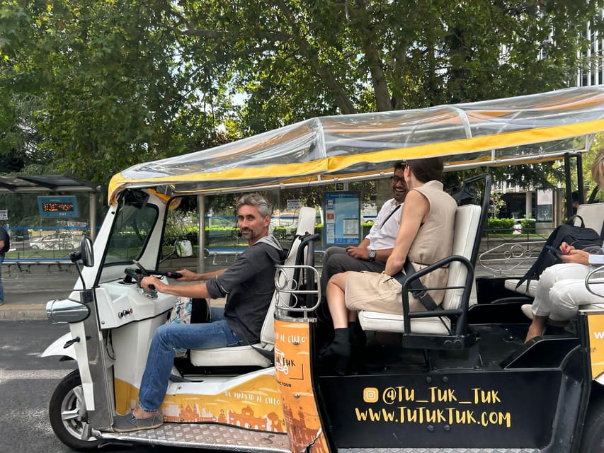 Madrid: Panoramic tour with Private guide in yellow Tuk Tuk - Starting at Plaza Isabel II and the Royal Palace