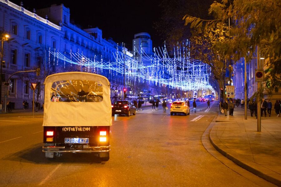 Madrid: Private Christmas Lights Tour by Eco Tuk-Tuk - Neptune Fountain, the Prado, and San Jerónimo el Real