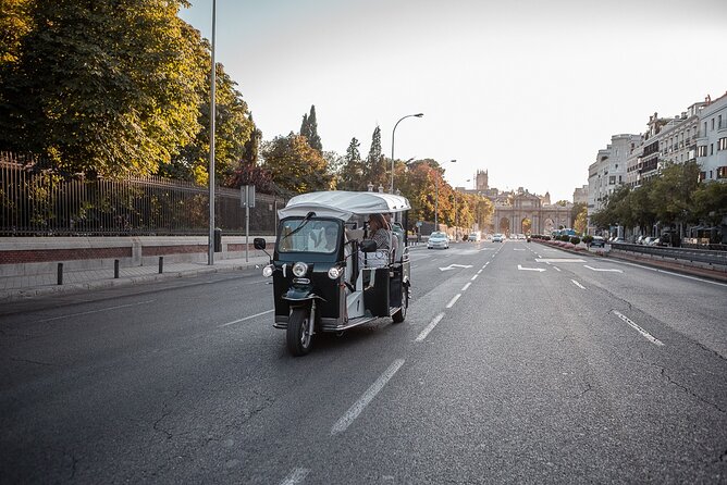 Madrid Welcome Tour with Local Guide in Eco Tuk Tuk Private - The grand route through Cibeles and Neptune