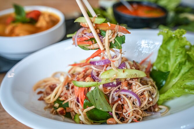 Old Siem Reap Sunset Food Tour by Tuk-tuk - Stop three: Phnom Krom and dinner at Brother Vet’s home