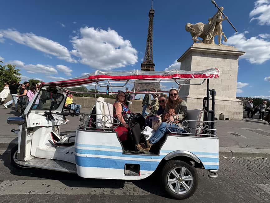 Paris by tuk-tuk: A private tour of the city's iconic landmarks - The Arc de Triomphe and Champs-Élysées