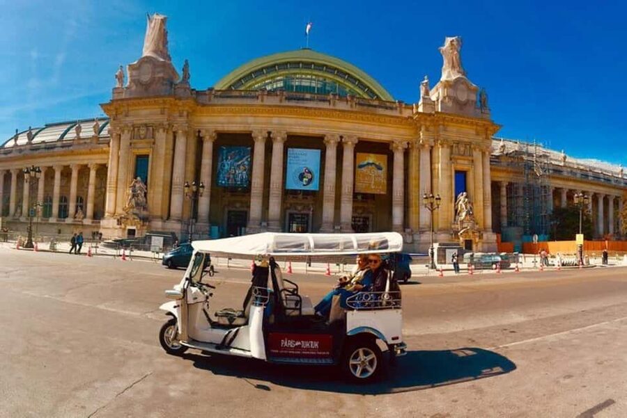 Paris: Most Iconic Monuments Guided Tour by Tuk Tuk - Starting at Invalides and heading toward the Champs Elysées