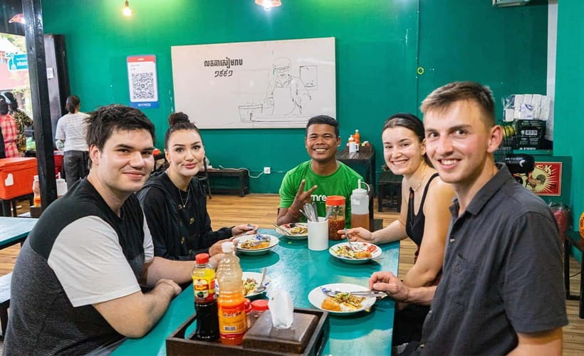 Phnom Penh: Evening Food Tour with Drinks & Tuk Tuk Included - The riverfront sets the evening mood
