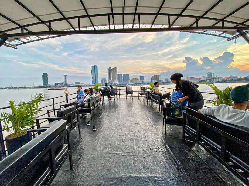 Phnom Penh: Mekong River Sunset Cruise and Tuk Tuk Ride - Boarding the traditional wooden boat