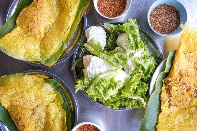 Phnom Penh Morning Market & Food Tour by Tuktuk - Includes All Food & Drinks! - Stop four: grilled pork and rice at a family shop