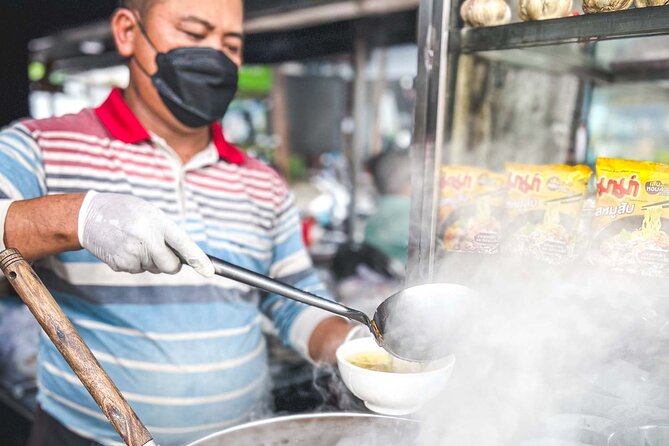 Phnom Penh Morning Market & Food Tour by Tuktuk - Includes All Food & Drinks! - Stop two: noodle soup and local coffee
