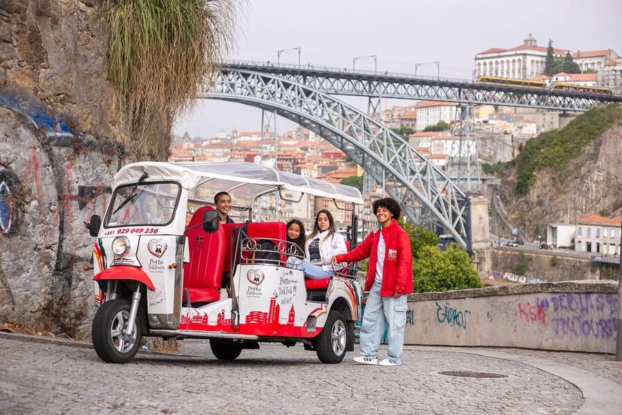Porto: Tuk tuk Tours with Port Wine Tasting - Ribeira’s narrow streets and river views